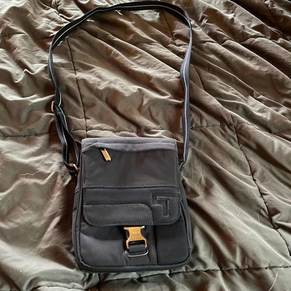 Tumi multi pocket cross body bag